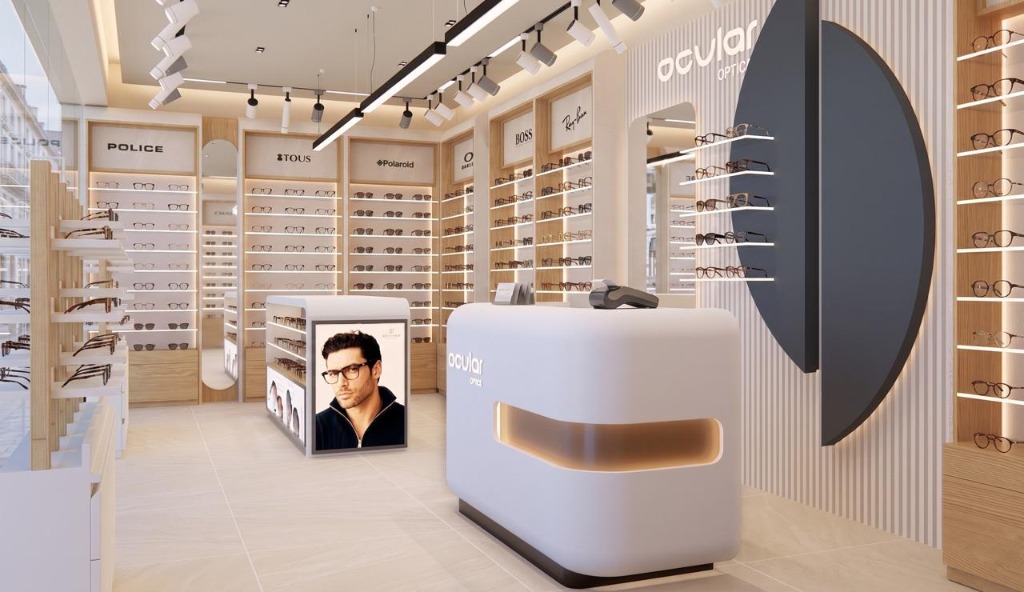 Ocular Opticals showroom display showcasing designer eyewear brands like Police, Tous, Polaroid, Boss and Ray-Ban